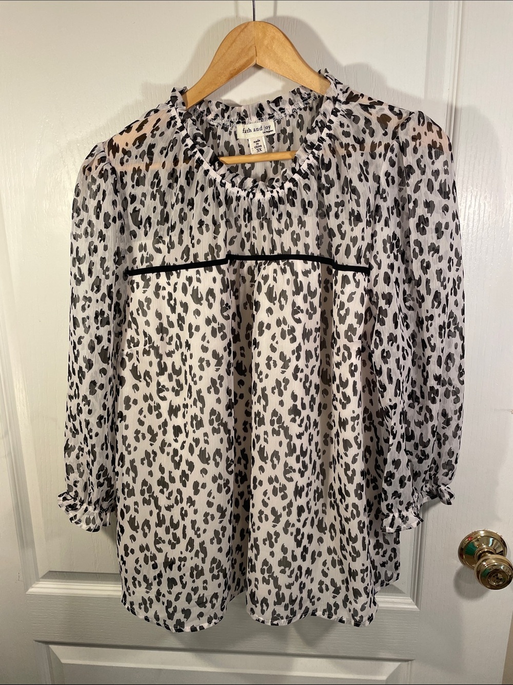 Faith and Joy Black and White Leopard Print Ruffle Neck Blouse